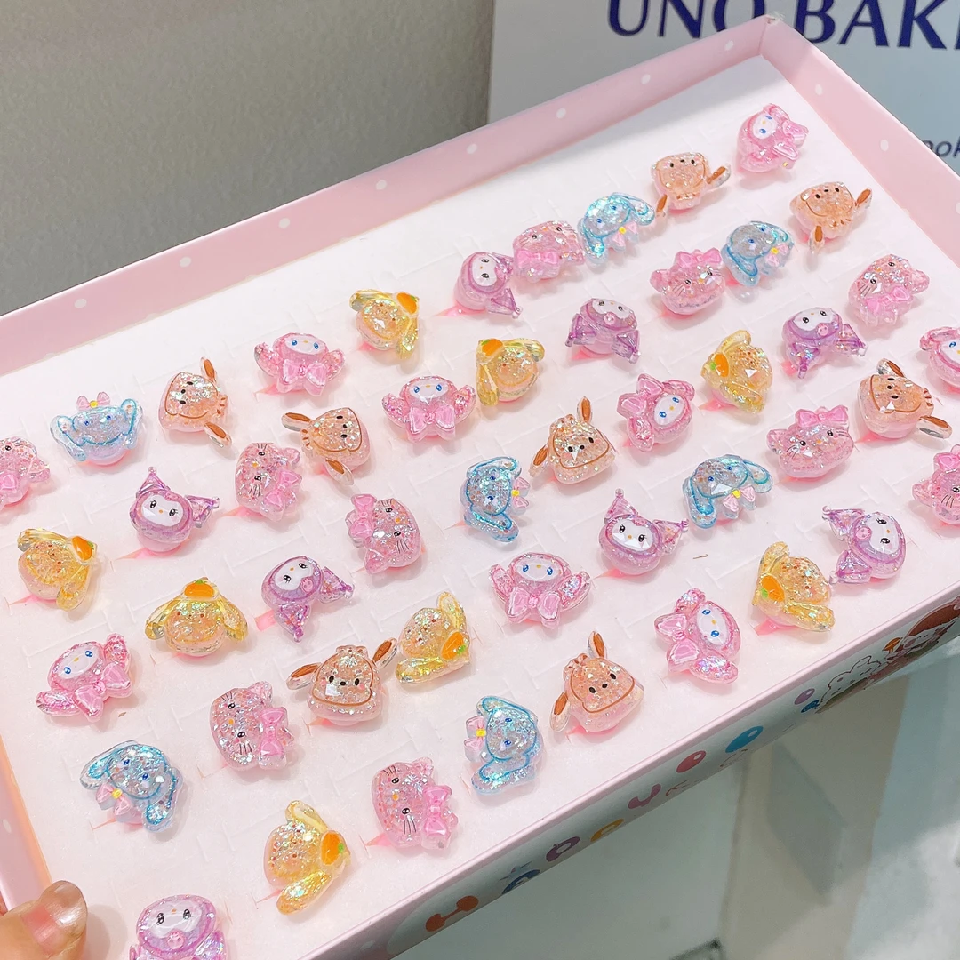 A-6841  tn  混色5个夜光旋转卡通玩偶爆闪切面戒指        发圈