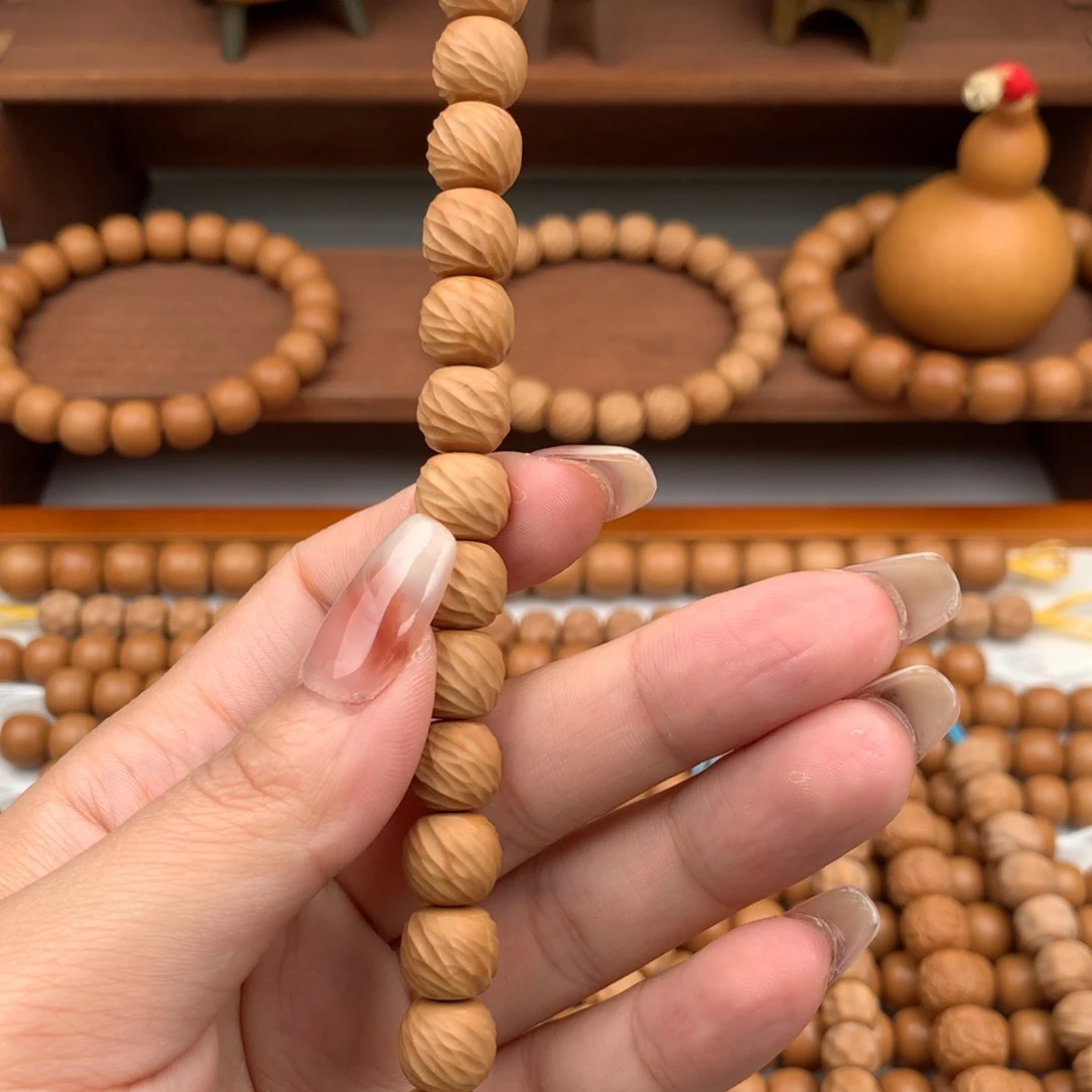 猴头核桃手串ℳ****微瑕云锦