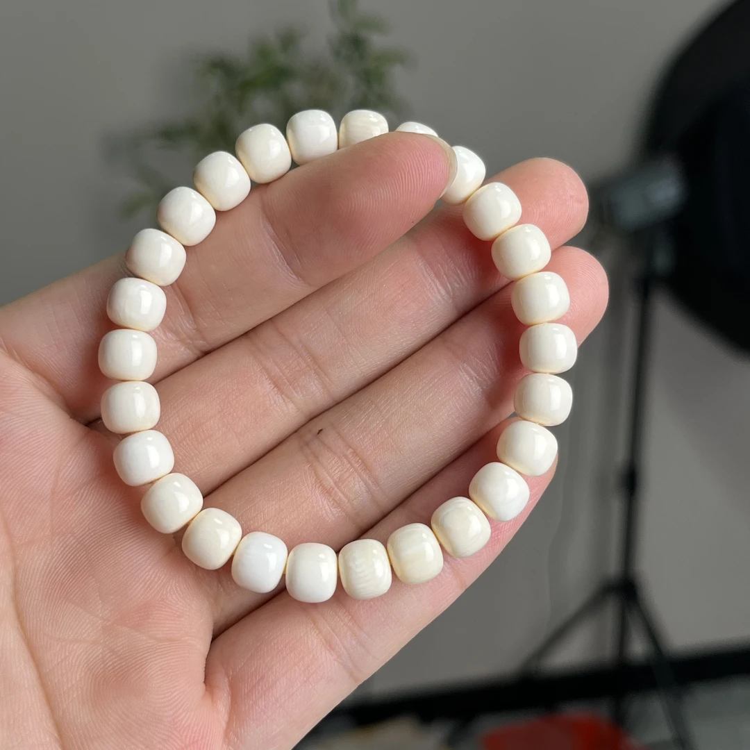 约8*7mm猛犸牙老型珠单圈手串