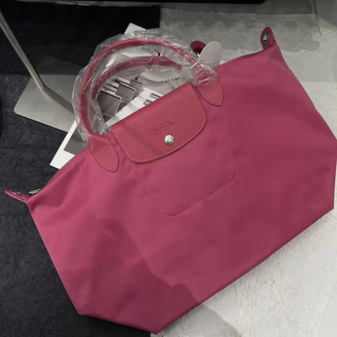 95新 LONGCHAMP/珑骧 覆盆子粉红饺子手提包