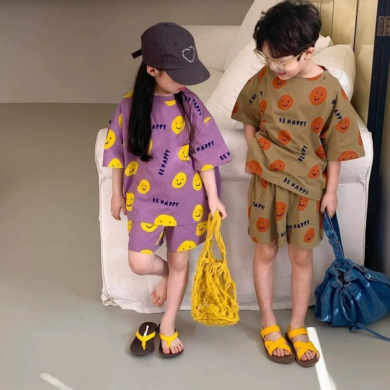 韩版儿童休闲套装夏季洋气短袖短裤男女宝宝卡通笑脸两件套运动