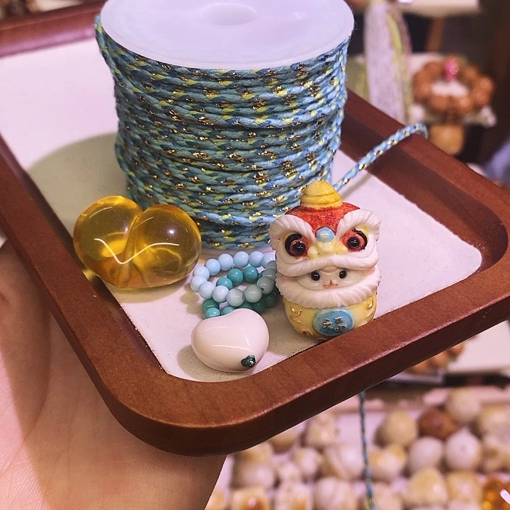 姜***、手串猴头核桃配件三个加流苏