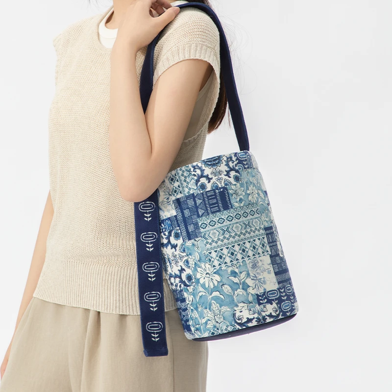 尼睿插画师原创青花百搭飘带水桶包单肩斜跨女手提小众通勤包女