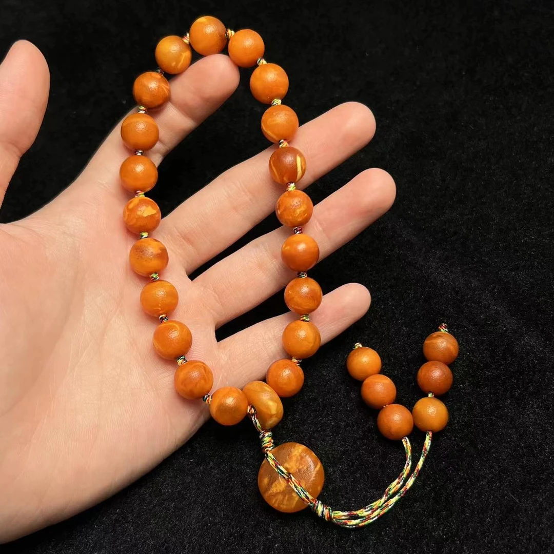 【壹芳珠宝】天然原矿微瑕蜜蜡橘皮圆珠手持 10mm