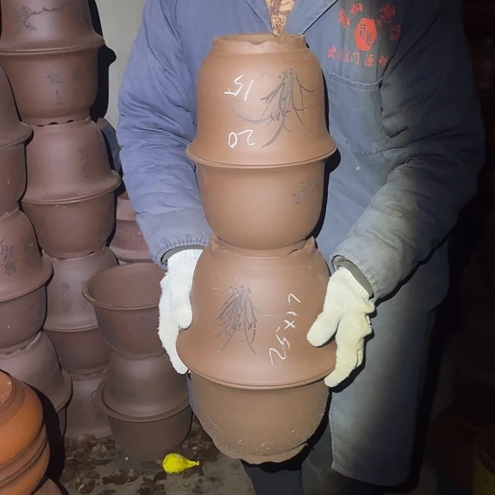 紫砂花盆紫砂花盆和红陶茶具等等