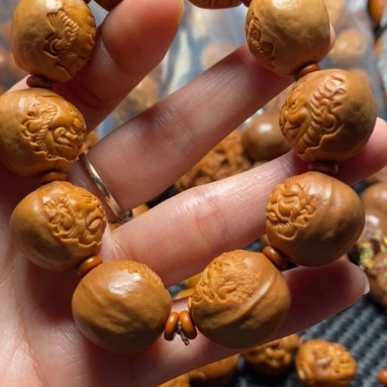 橄榄核吊坠包衣达摩