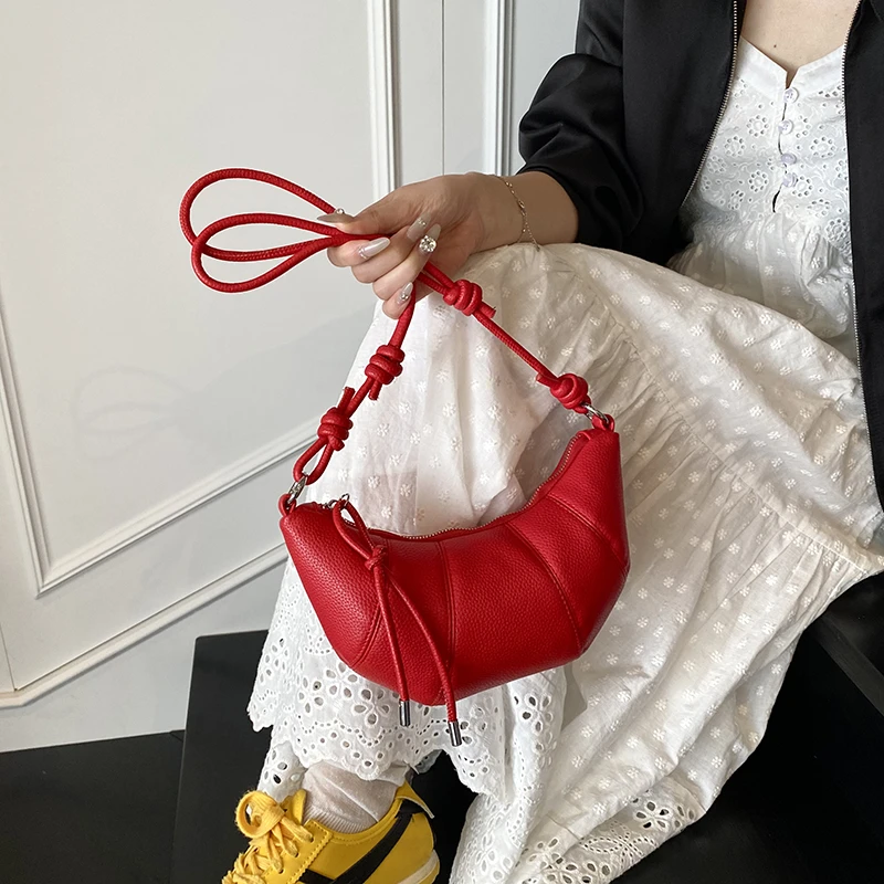 独特小众饺子包包女2025新款百搭斜挎包精致超火单肩腋下包牛角包