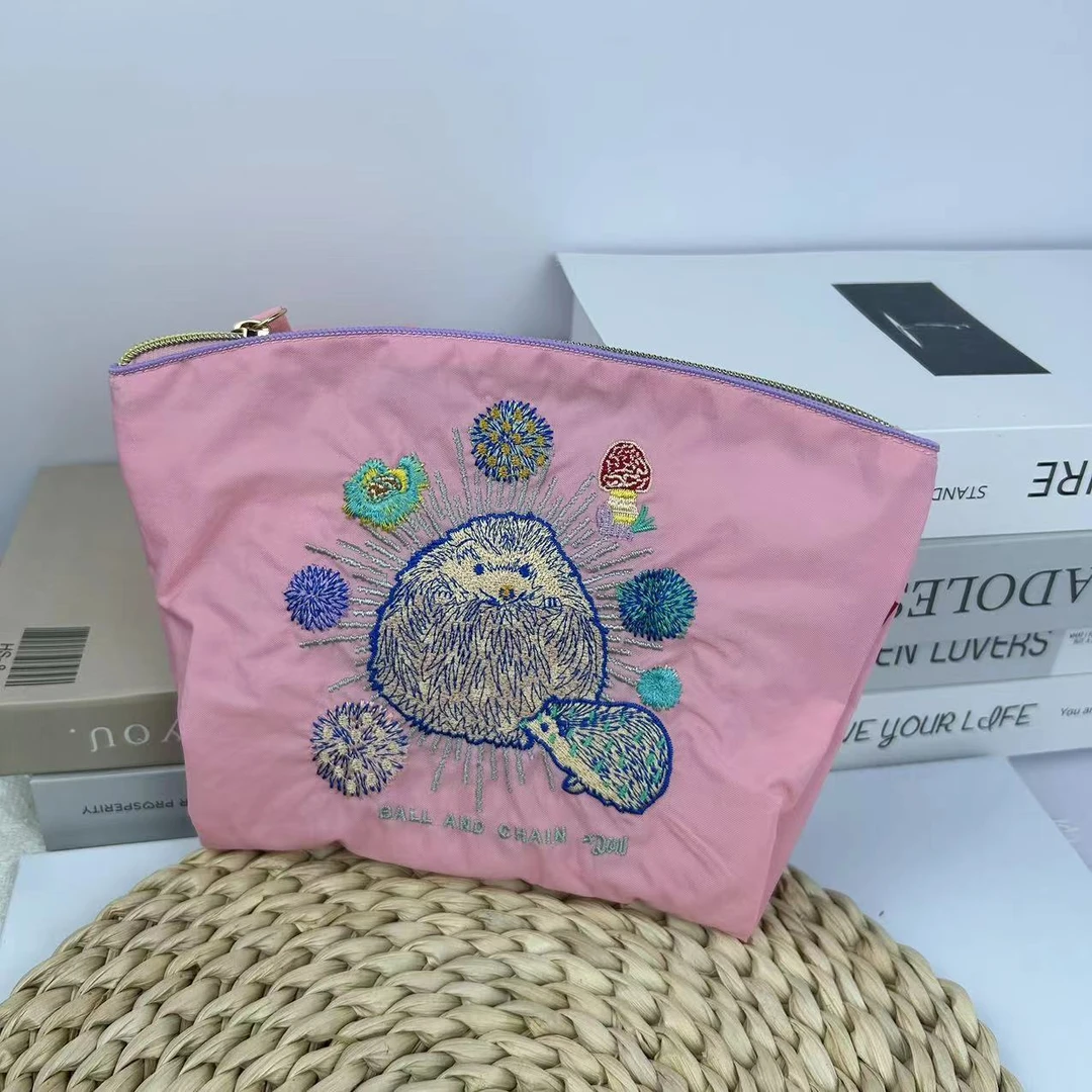 【子溪说衣】日系小众刺绣化妆包防水尼龙收纳袋女甜甜圈小包零钱包