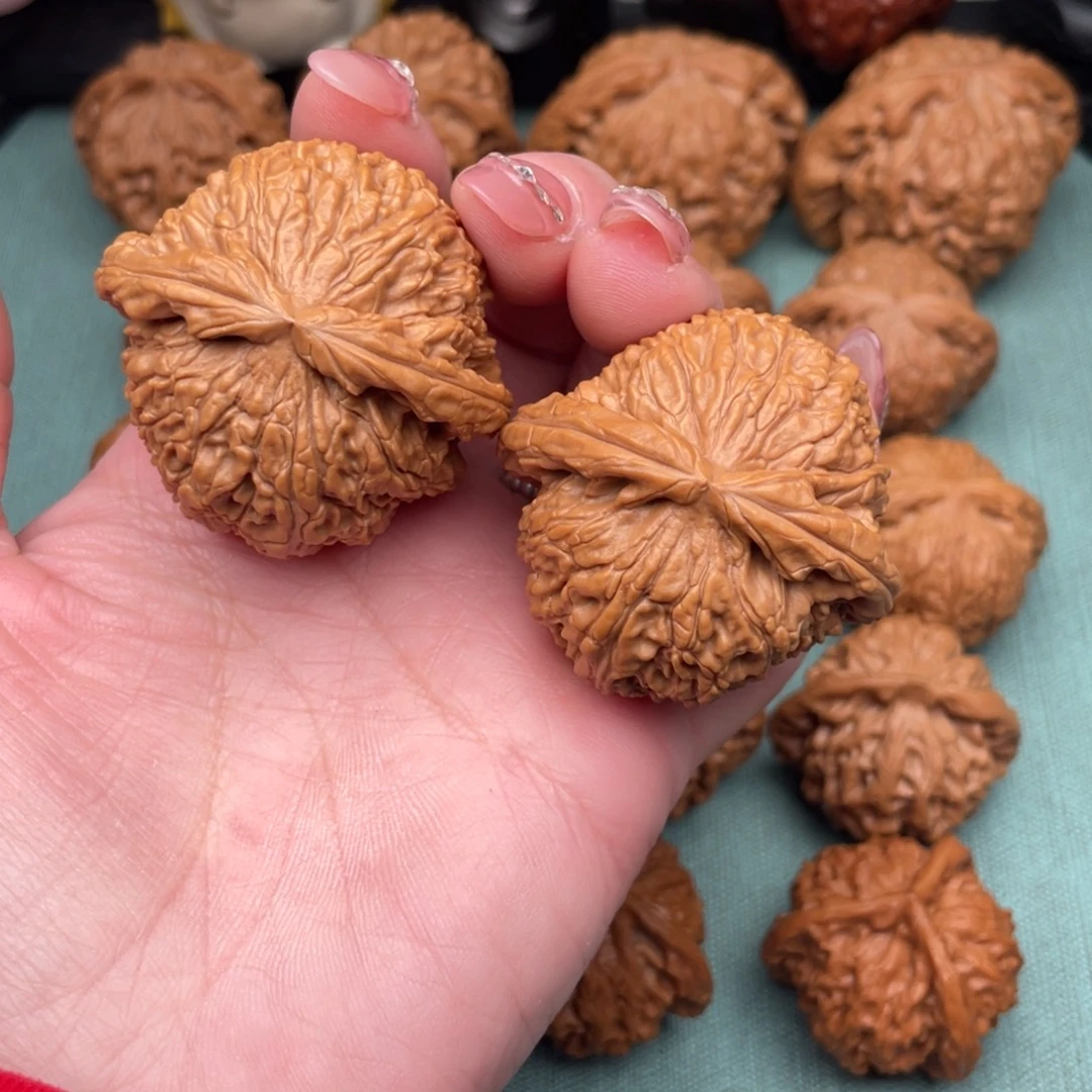 愚***人把件文玩核桃全品白狮子43.5