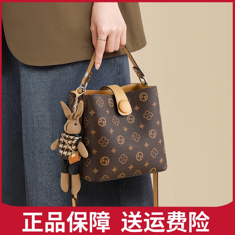 君澜水桶包包2025新款夏季女包手提妈妈包高级感单肩通勤斜挎包