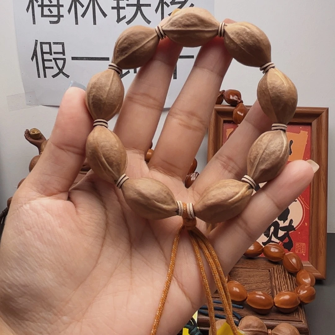 M***辉橄榄核手串18.27梅林铁核