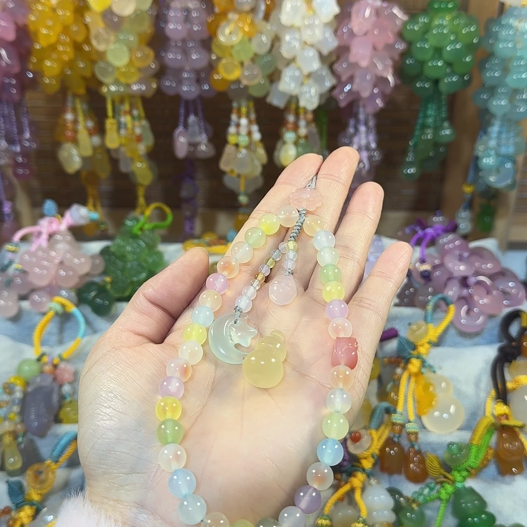 沐***沐玛瑙/玉髓未镶嵌手机挂件