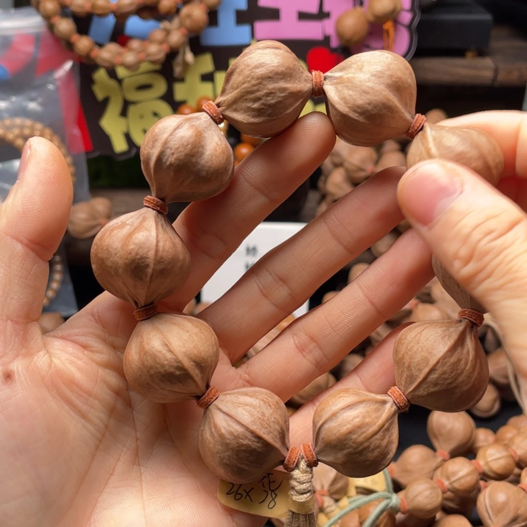 用***0吊坠橄榄核2628四花铁核