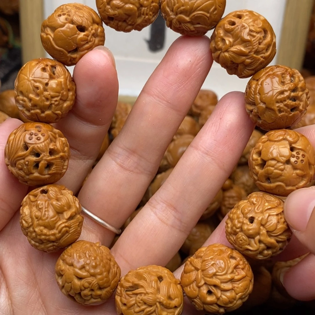 橄榄核手串镂空金蟾