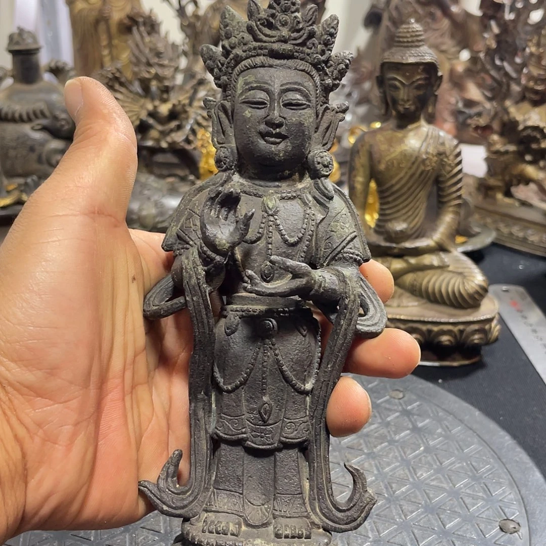 小***檀站观音。        999