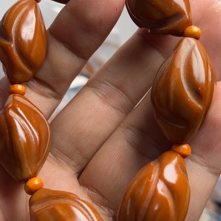 橄榄核吊坠不能给她