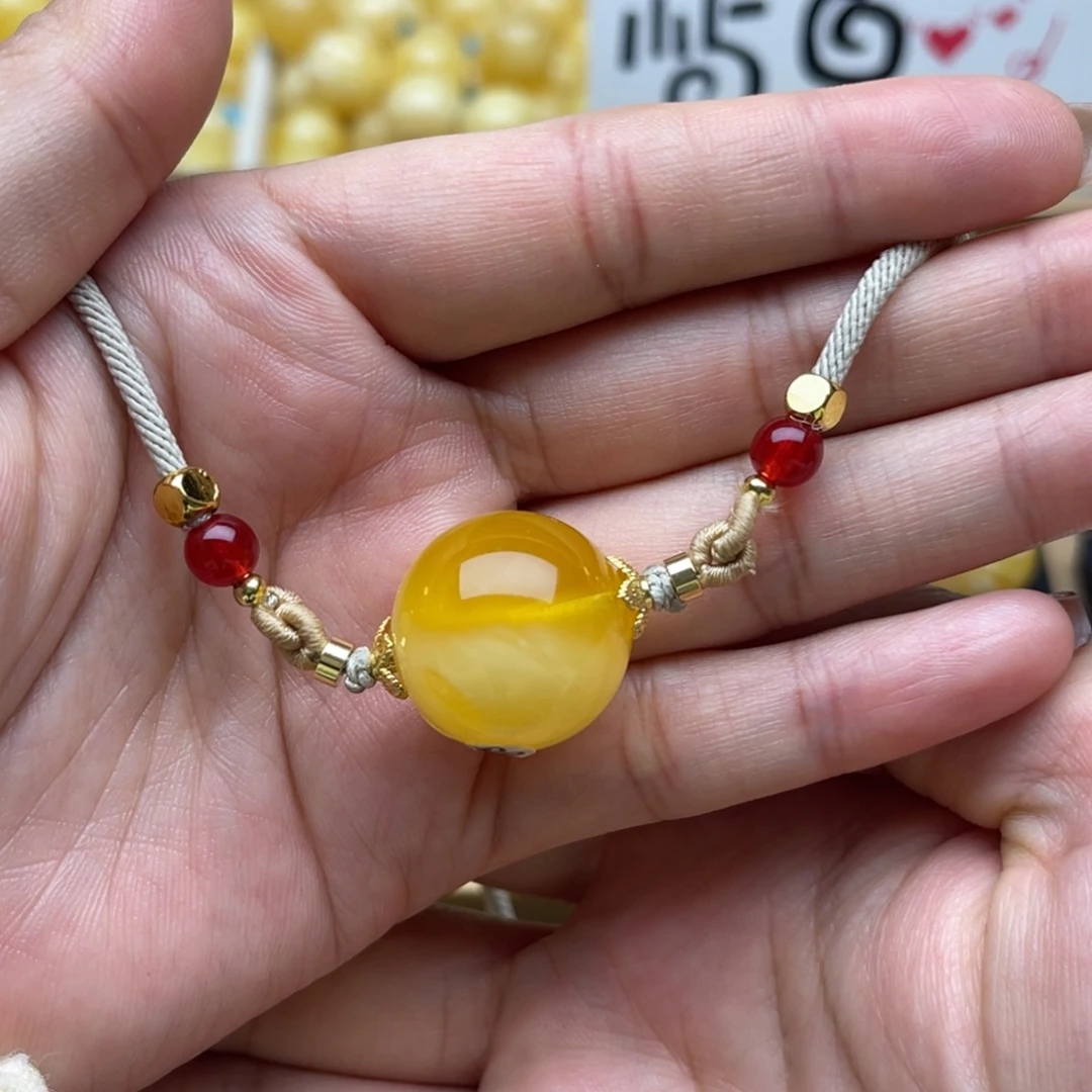 琥珀未镶嵌裸石蜜蜡圆珠微瑕笑