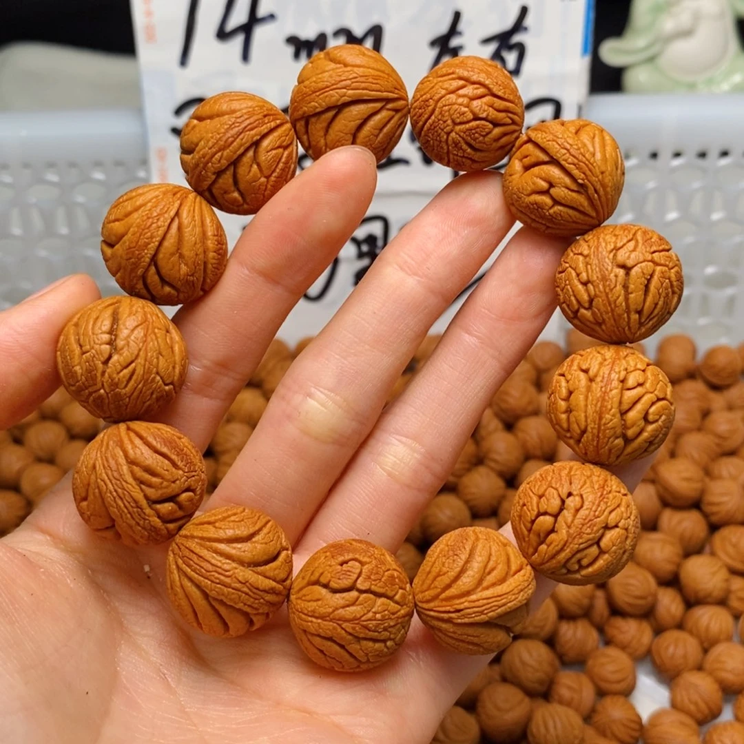 桃核手串琴****会18mm左右金丝龙珠单圈