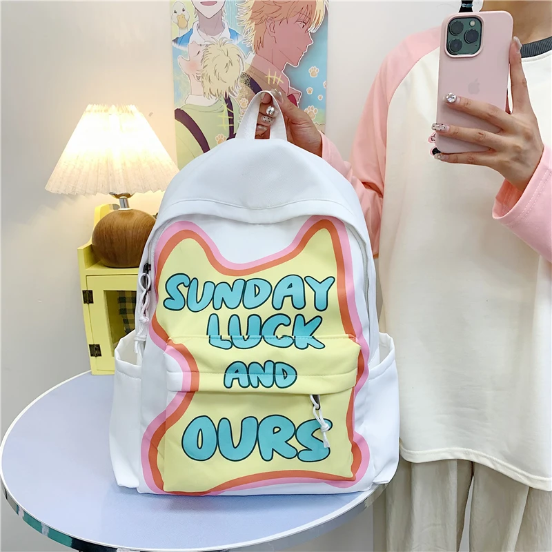 新款印花大学生学生书包初中生高中生大容量可爱双肩包字母背包