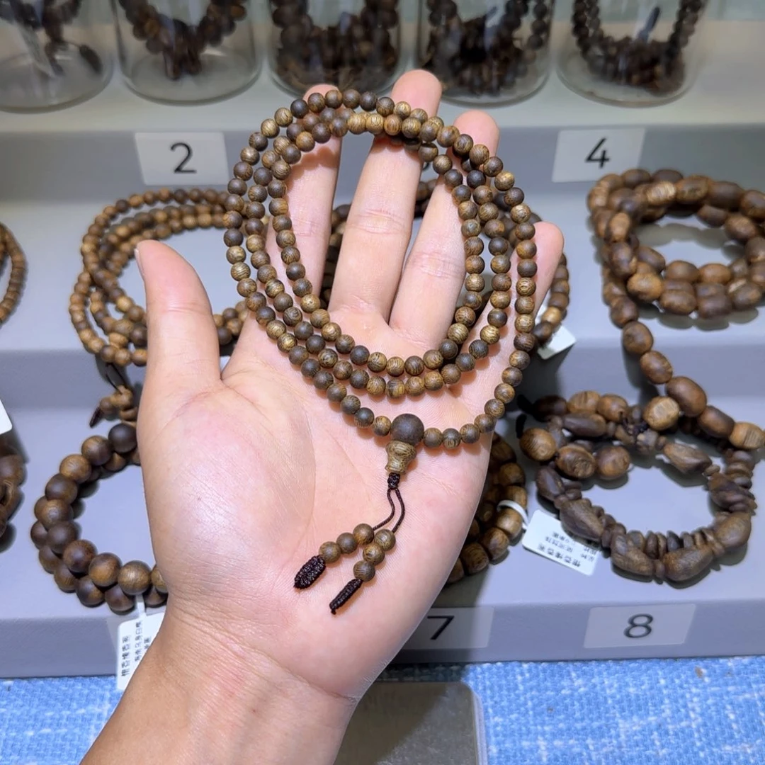 沉香沉香碎屑海南乌身白棋沉水浮0.5多圈11+