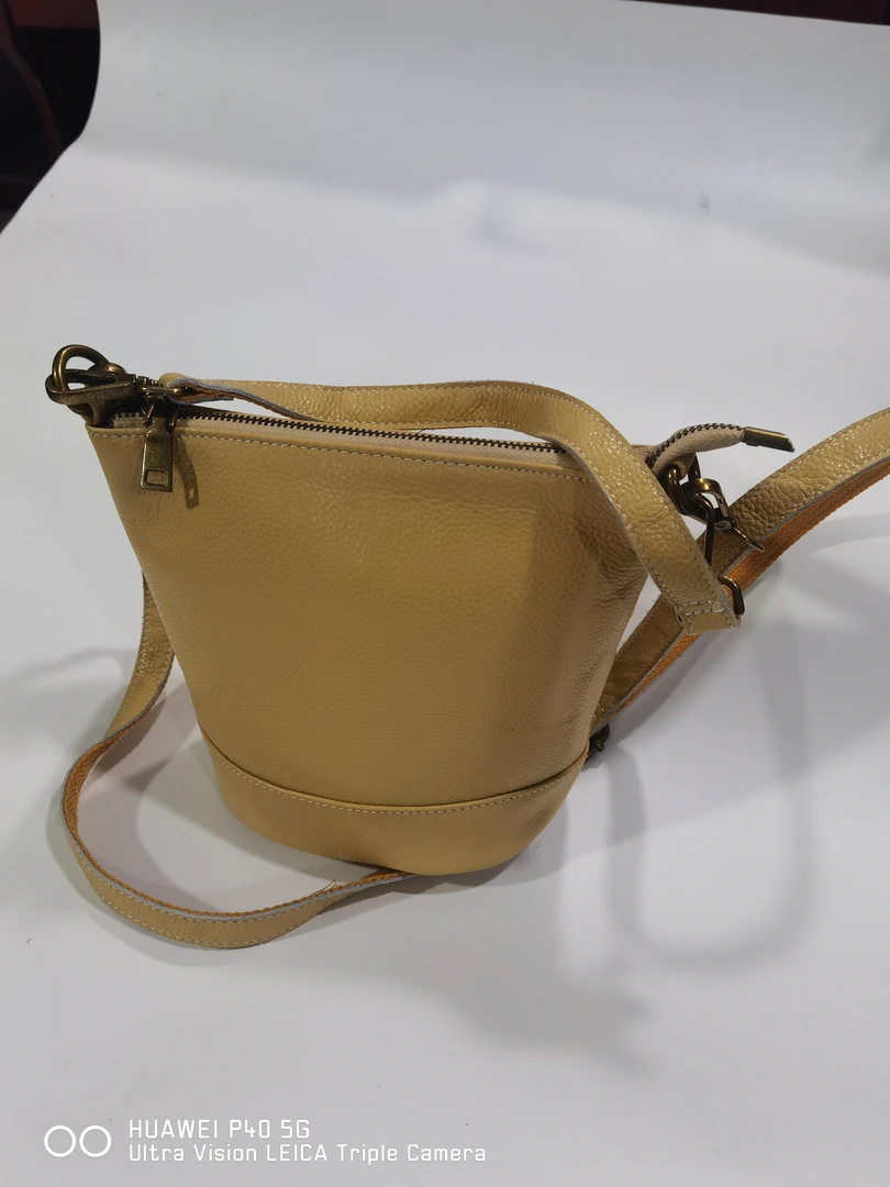 时尚头层牛皮斜挎包手提单肩真皮小水桶女包