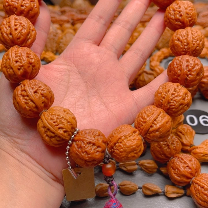 黑***服吊坠文玩核桃核桃手持