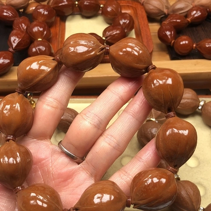 你***饼手串橄榄核梅林铁核23 X28