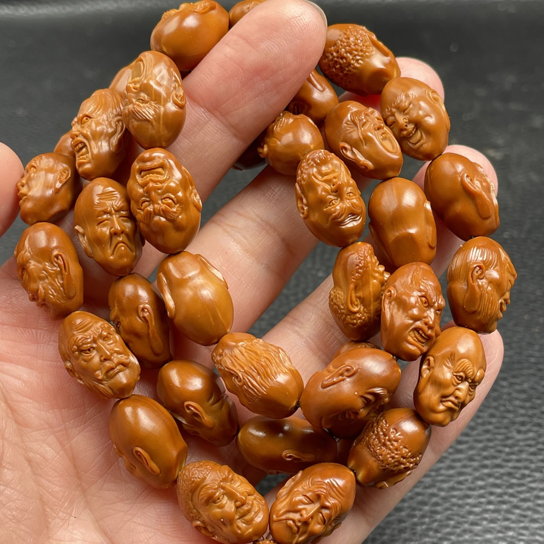 橄榄核铁核1.2玉化料36罗汉脖挂