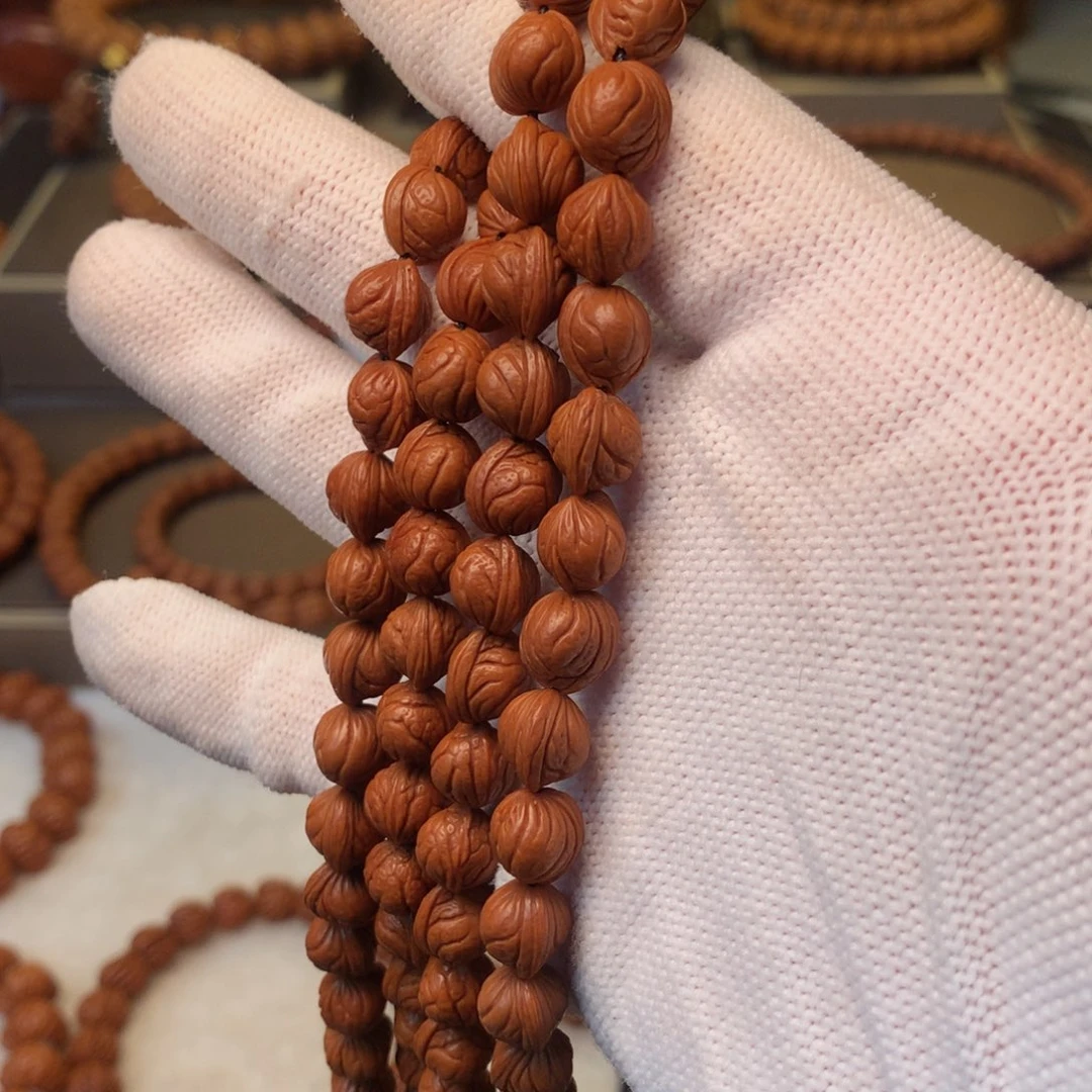 用***7桃核手串秦岭龙纹