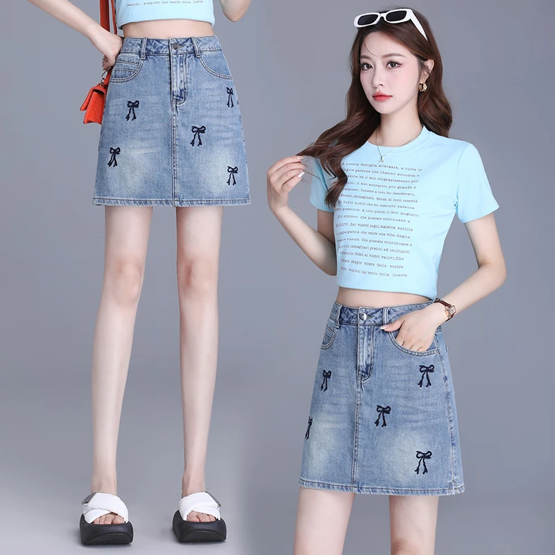 拉夏贝尔高级感蝴蝶结刺绣A字短裙女夏新款内衬防走光显瘦包臀裙