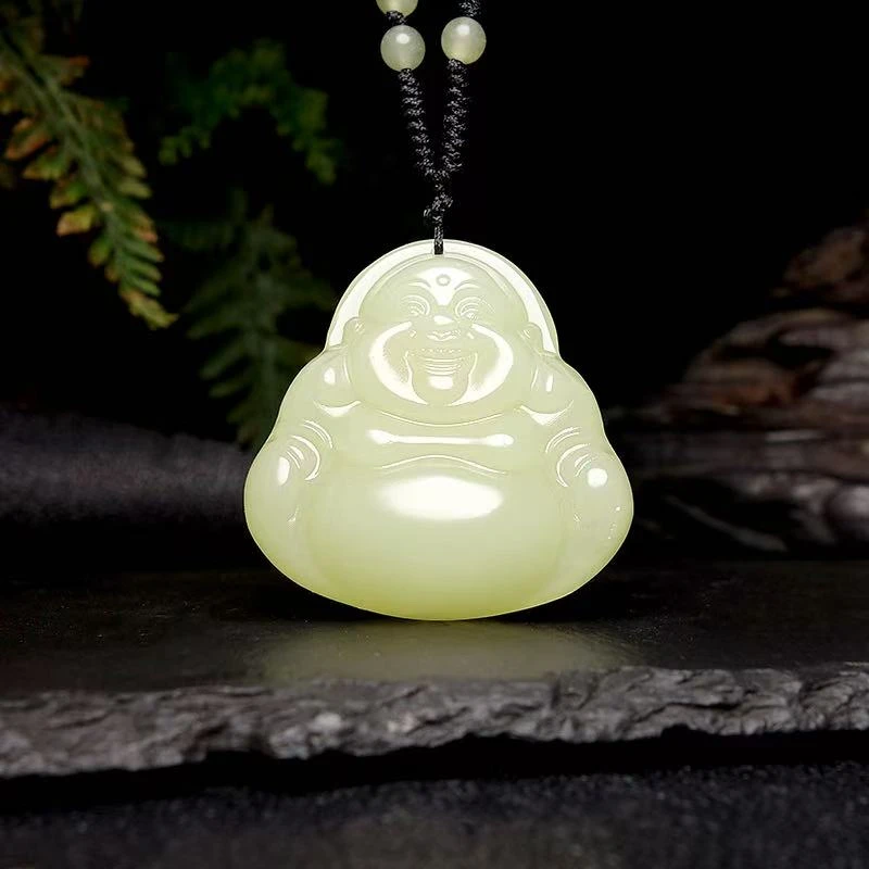 （阳阳）青海格尔木黄口料晴水色双面雕刻佛公