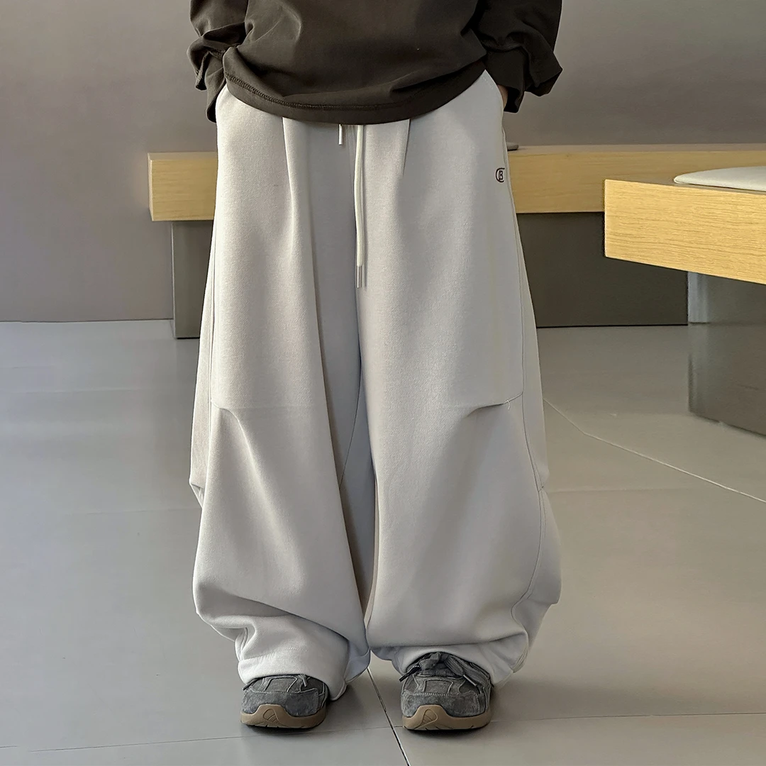 男童春秋季裤子2025新款男大童帅气卫裤宽松秋装弯刀裤儿童长裤潮