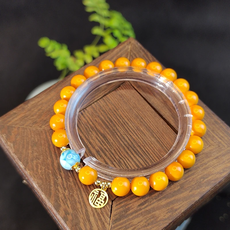 9526高档天然蜜蜡海纹石女士款鸡油红琥珀蜜蜡银镶轻奢手串7mm