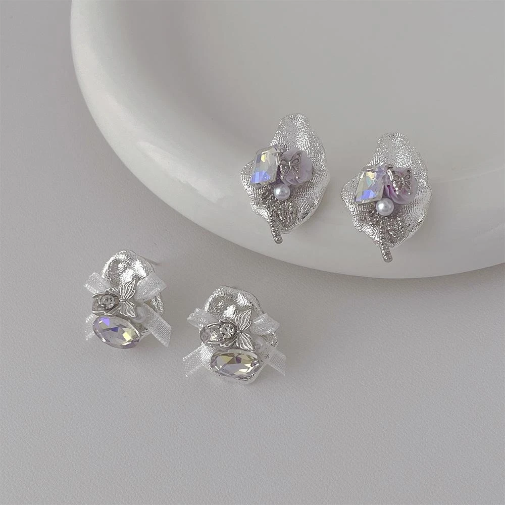 铜合金锆石耳饰 不规则金属锆石花朵蝴蝶结耳环女 s925银针轻奢耳