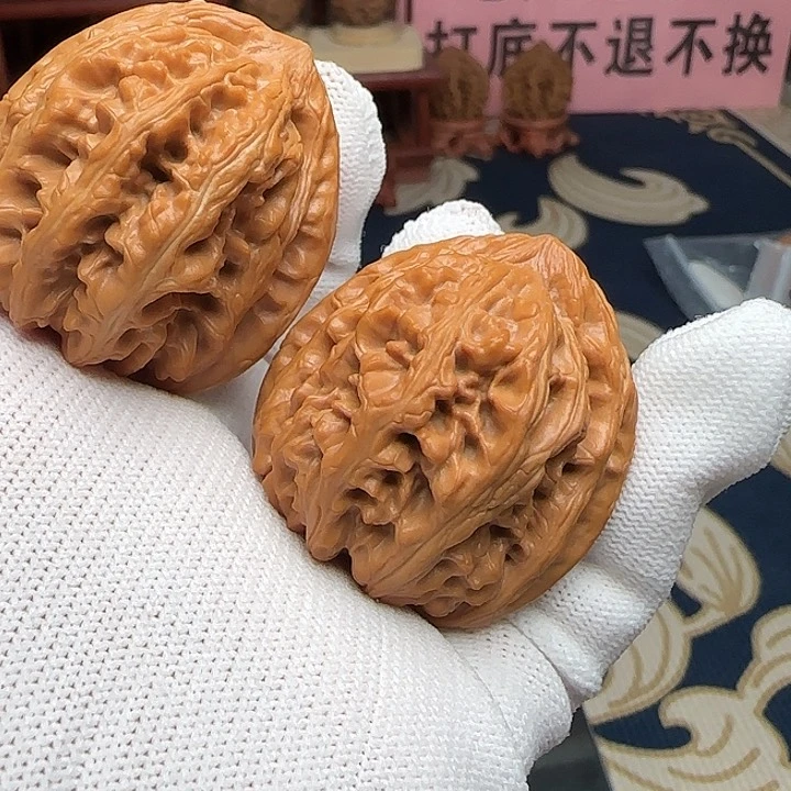 桃核吊坠全品三羊谷40尺
