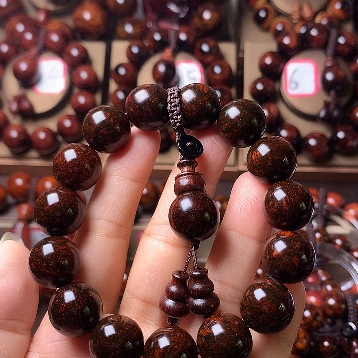 谦***逊花梨木类1.5黑金双面龙鳞纹