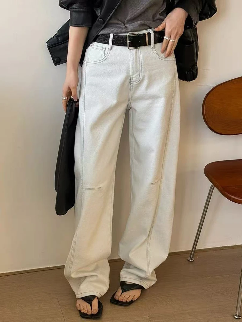 新款水洗弯刀牛仔裤宽松显瘦