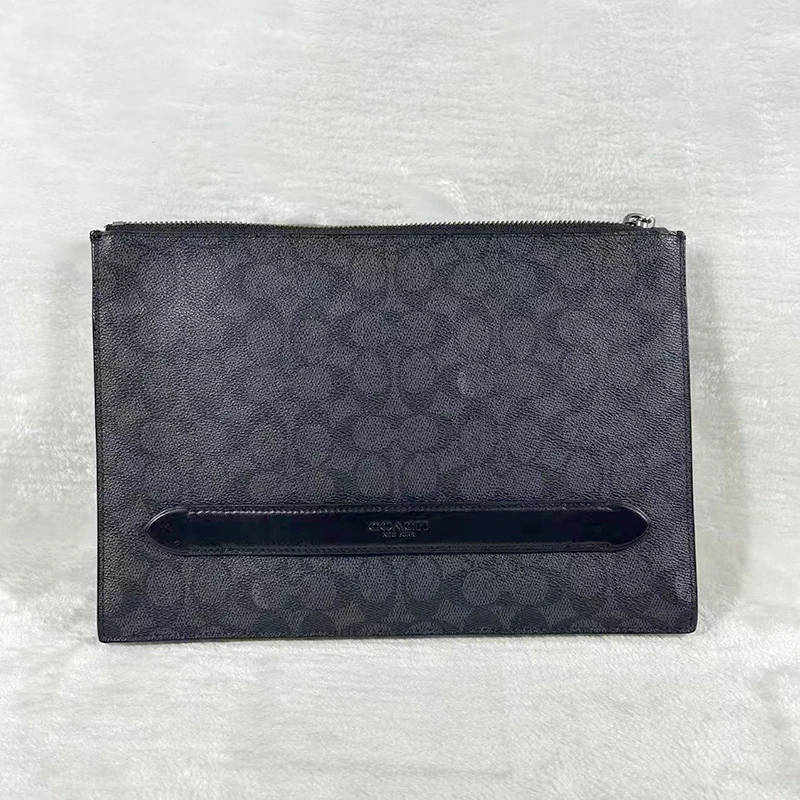 95新 COACH/蔻驰 黑色老花手拿包G24020092底长30x21