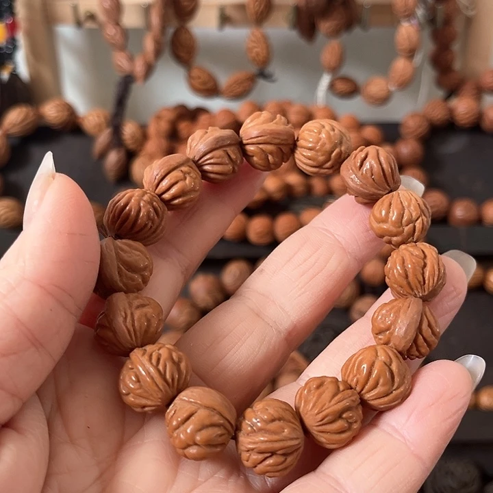 迷***>野生桃枭小籽手串