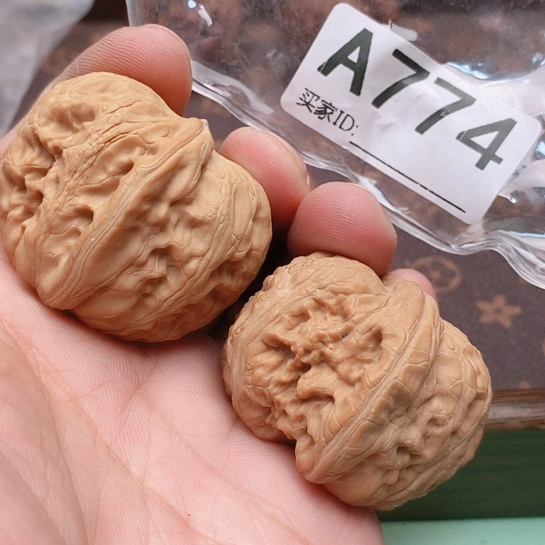 文玩核桃把件元宝40尺。