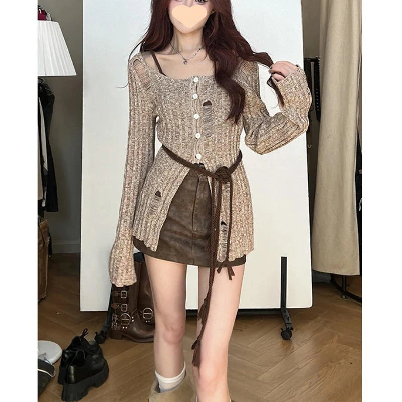 美拉德早秋爆款设计感开叉显高镂空针织气质毛衣+半身裙洋气套装