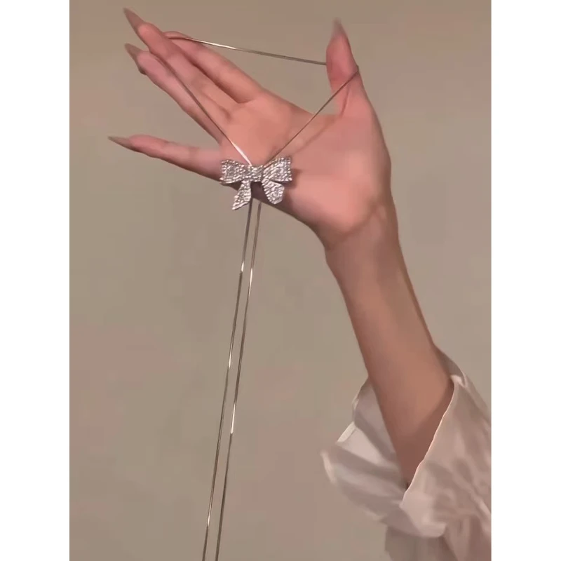 钛钢合成锆石吊坠 闪钻蝴蝶结毛衣链秋冬长款网红高级项链吊坠