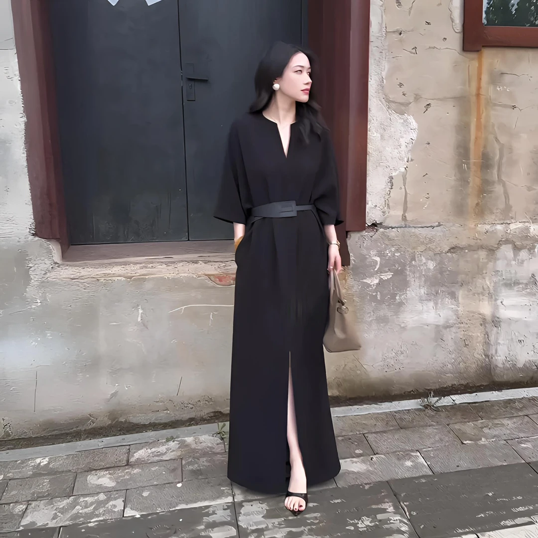 法式赫本风慵懒松弛感黑色V领连衣裙女早秋季新款显瘦气质长裙子