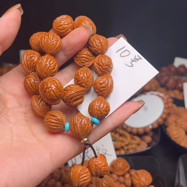 淡***定桃核吊坠荔枝16左右21颗手持