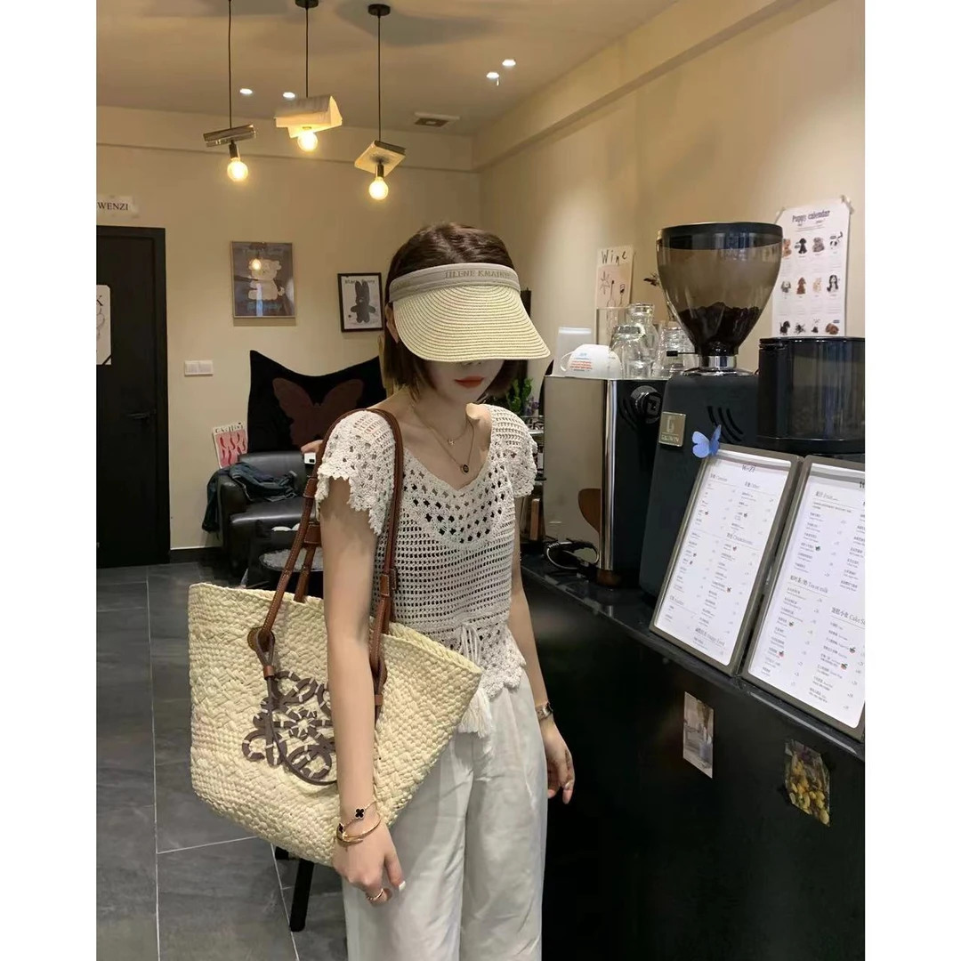 【萍萍推荐】夏季圆领重工镂空钩花飞飞袖线衫流苏绑带毛针织衫