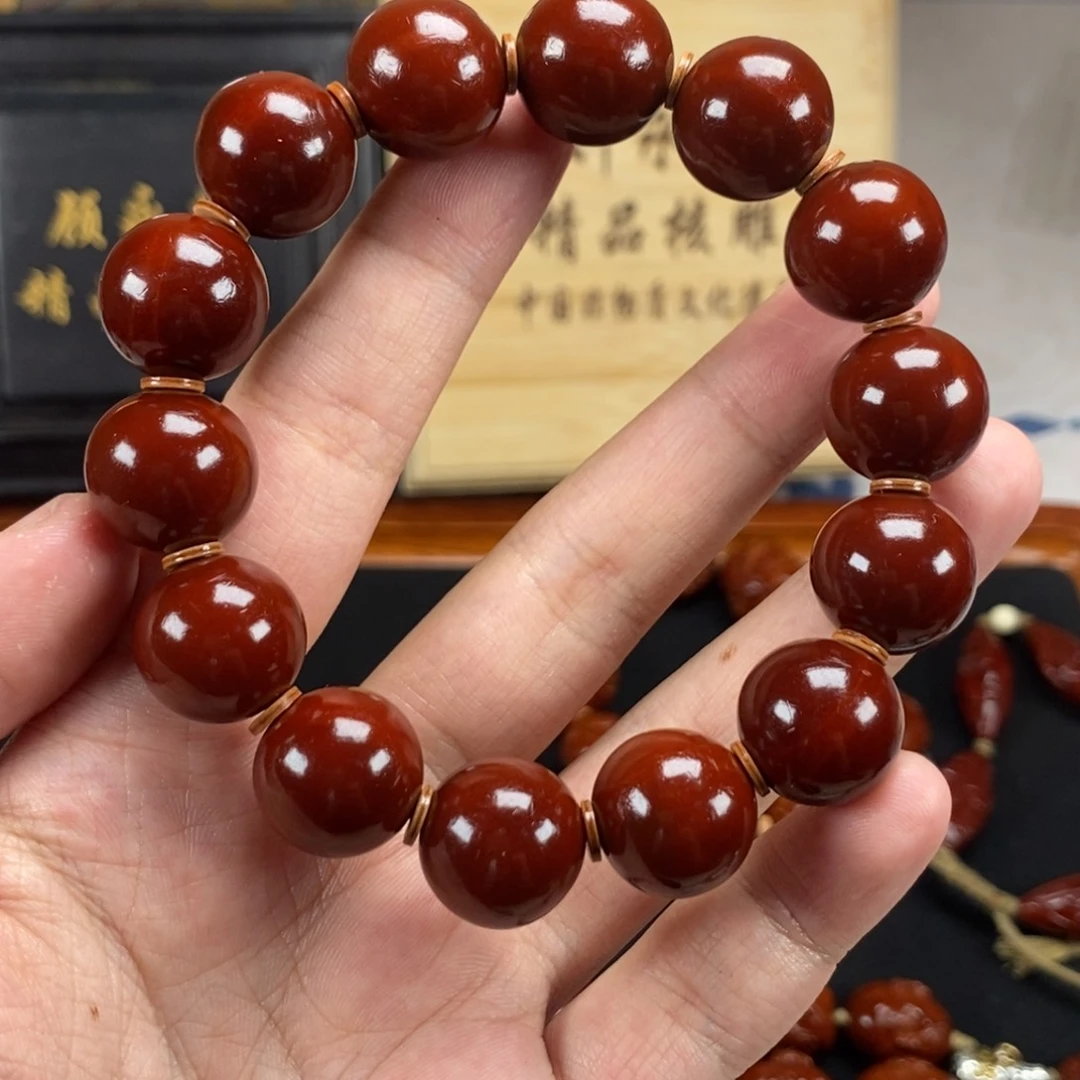 橄榄核手串一**富星回血光珠