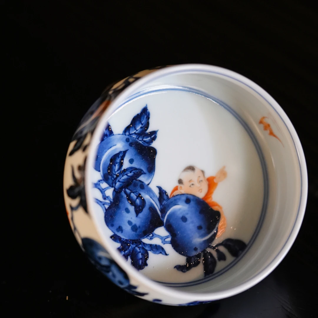 志纯窑童子指福寿桃杯