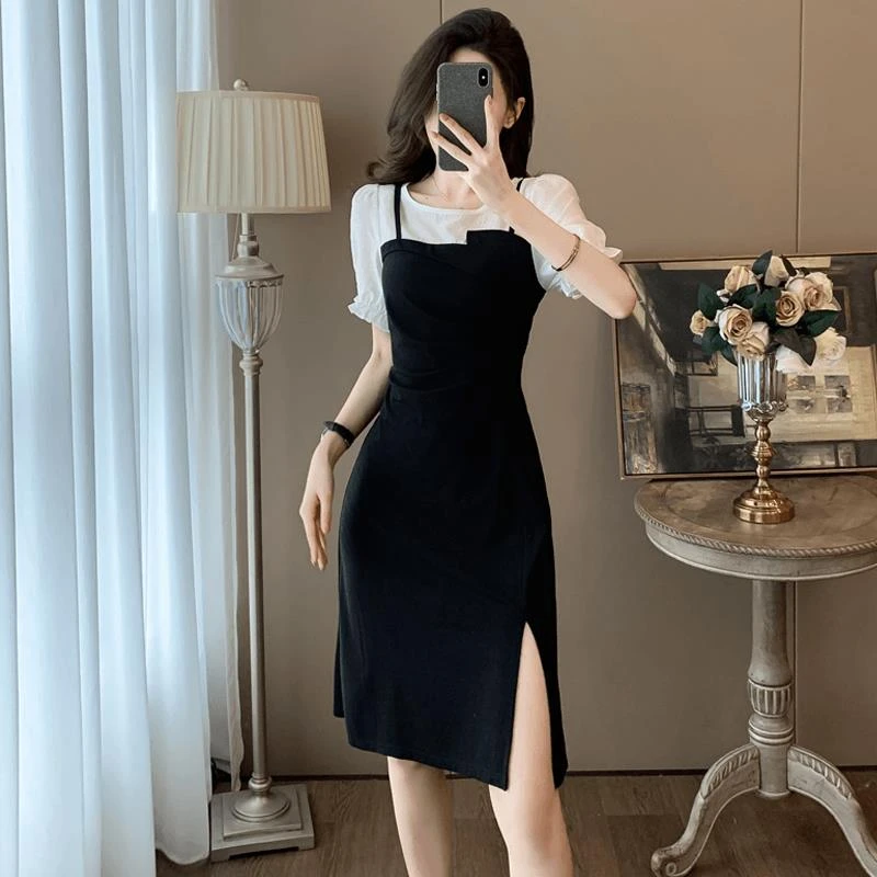 高级感开叉黑色裙子2025夏新款设计感拼接假两件短袖连衣裙女气质