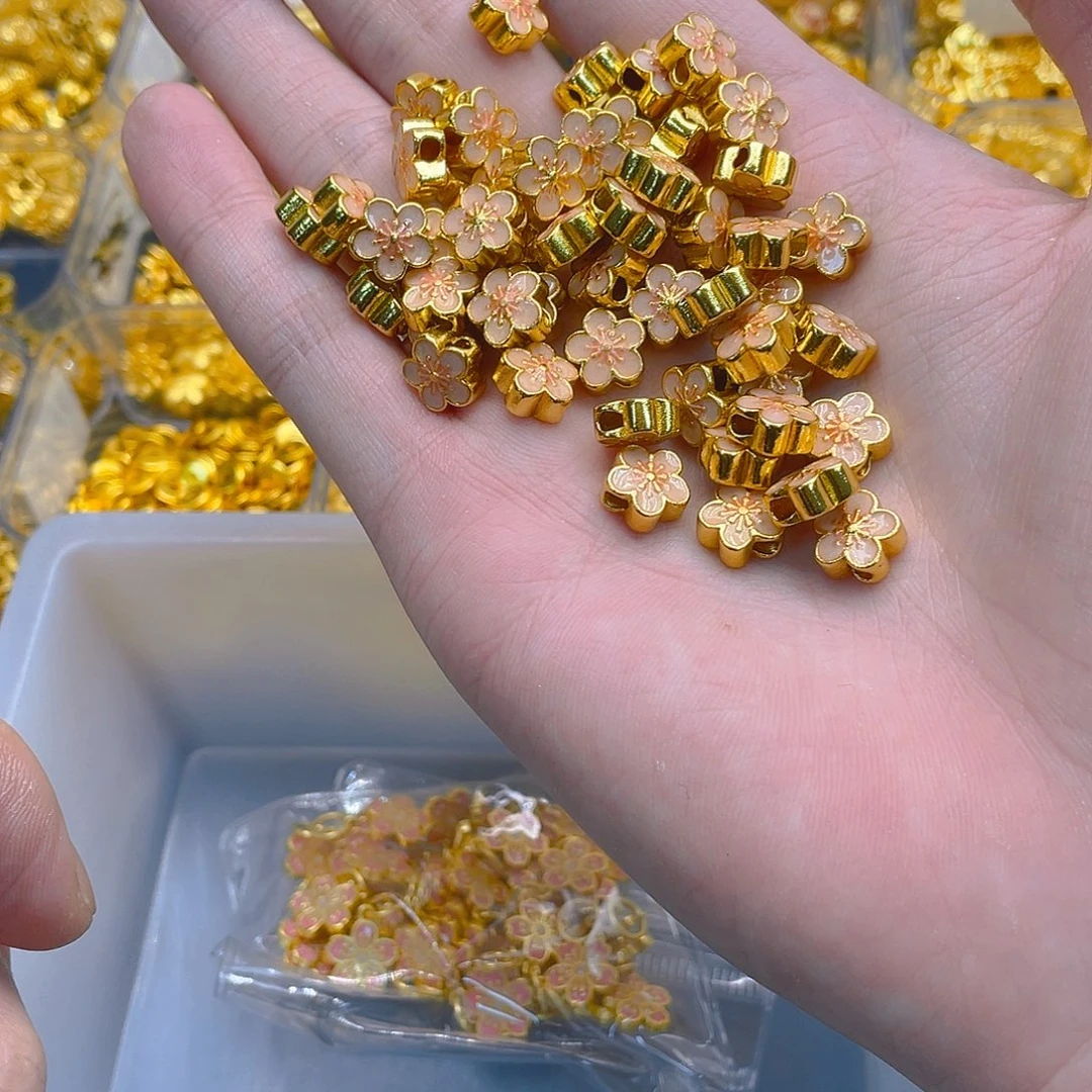 锆石铜合金桃花饼珠2个