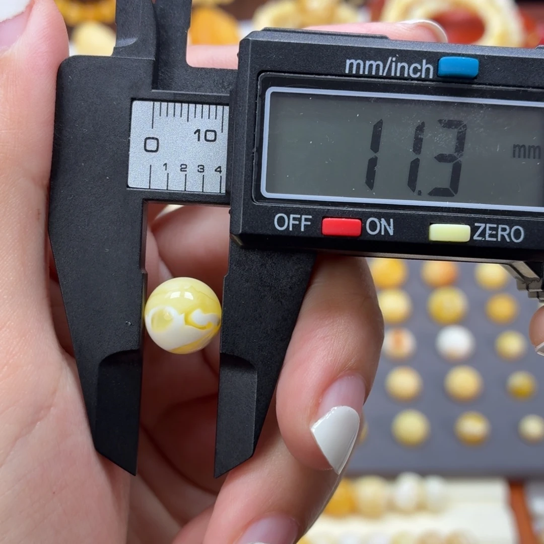 琥珀未镶嵌裸石焦皮瓷白花11.3mm